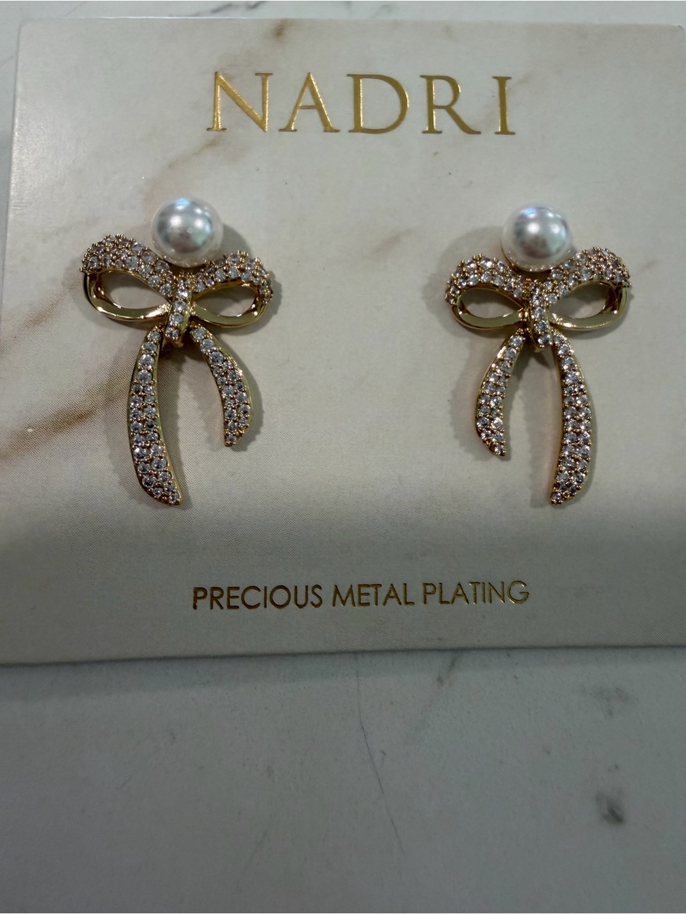 Nadri Gold Bow Earrings with White Pearl and Pave Crystals